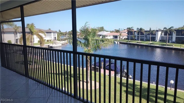 a view of a balcony with dining area