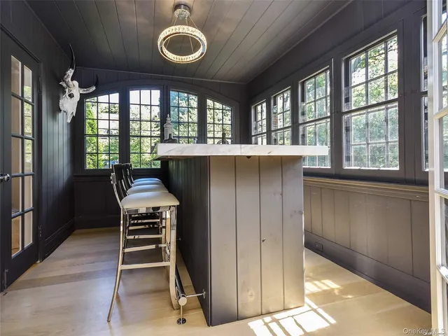 a view of room with window and furniture