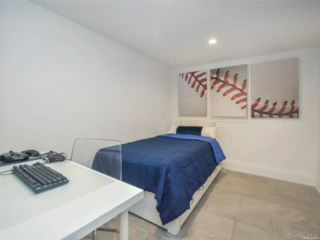 a bedroom with a bed and a table