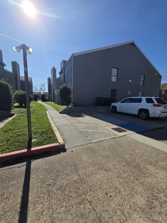 a car parked in front of a house