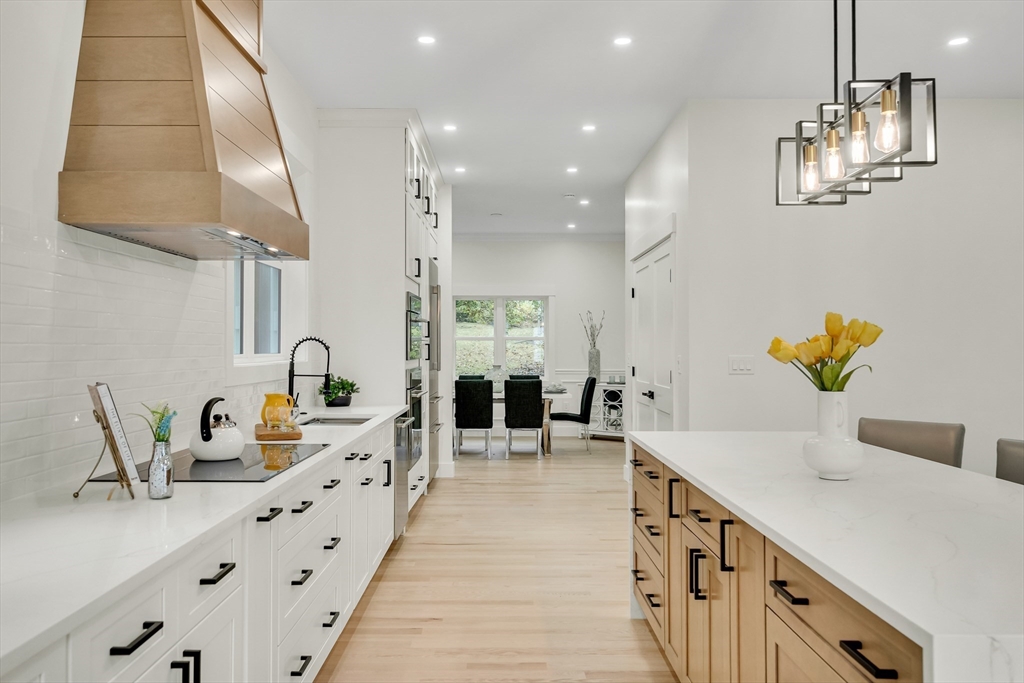 22 Estabrook Road Lexington, MA 02421 - Photo 13 of 36 a kitchen with sink a counter and cabinets