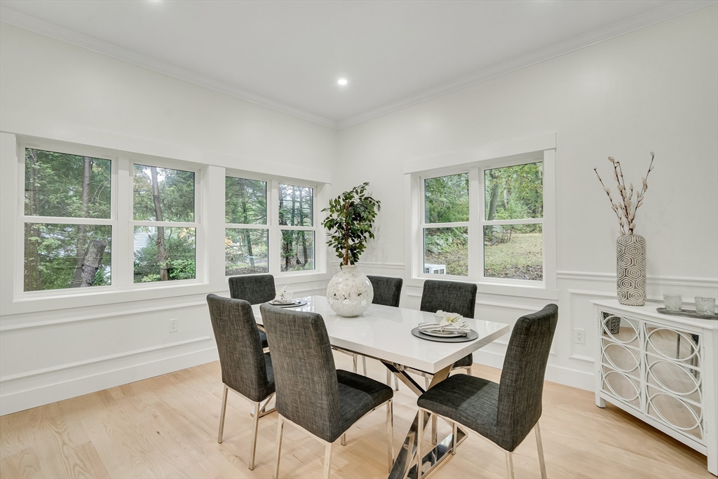 22 Estabrook Road Lexington, MA 02421 - Photo 16 of 36 a view of a dining room with furniture window and outside view