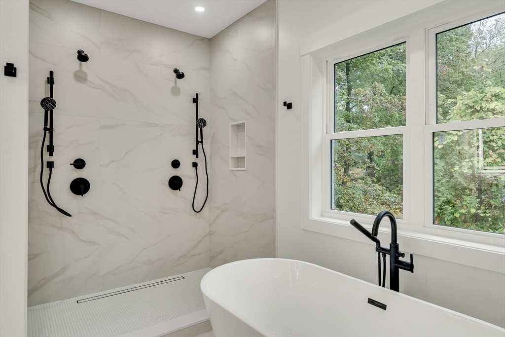 22 Estabrook Road Lexington, MA 02421 - Photo 24 of 36 a bathroom with a sink a toilet and shower