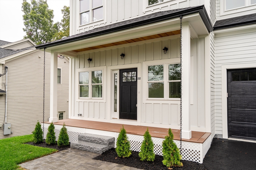 22 Estabrook Road Lexington, MA 02421 - Photo 4 of 36 a front view of a house with a yard