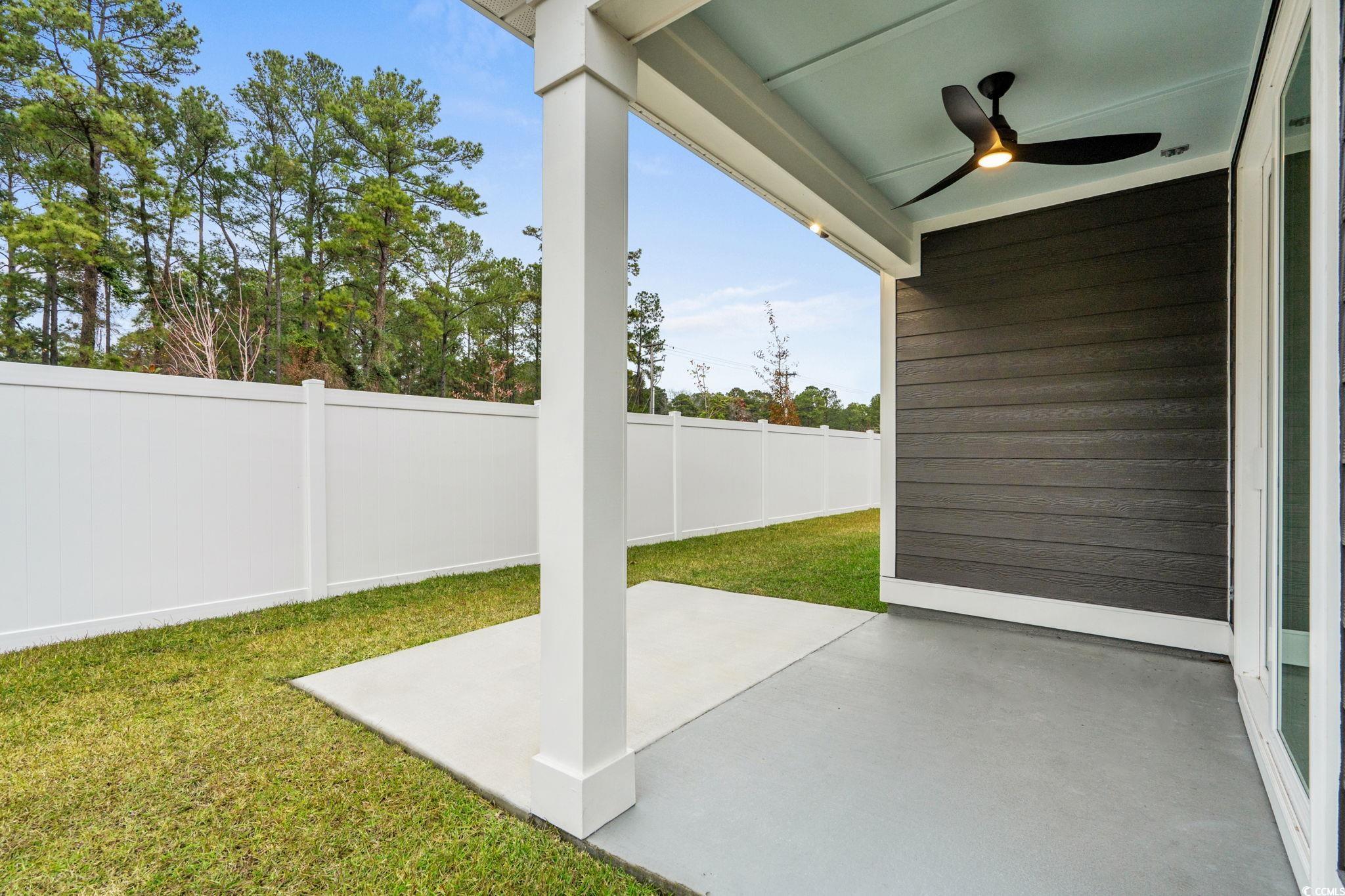 164 Arbor Ridge Circle Conway, SC 29526 - Photo 17 of 38 Fenced backyard with a patio area and a ceiling fan