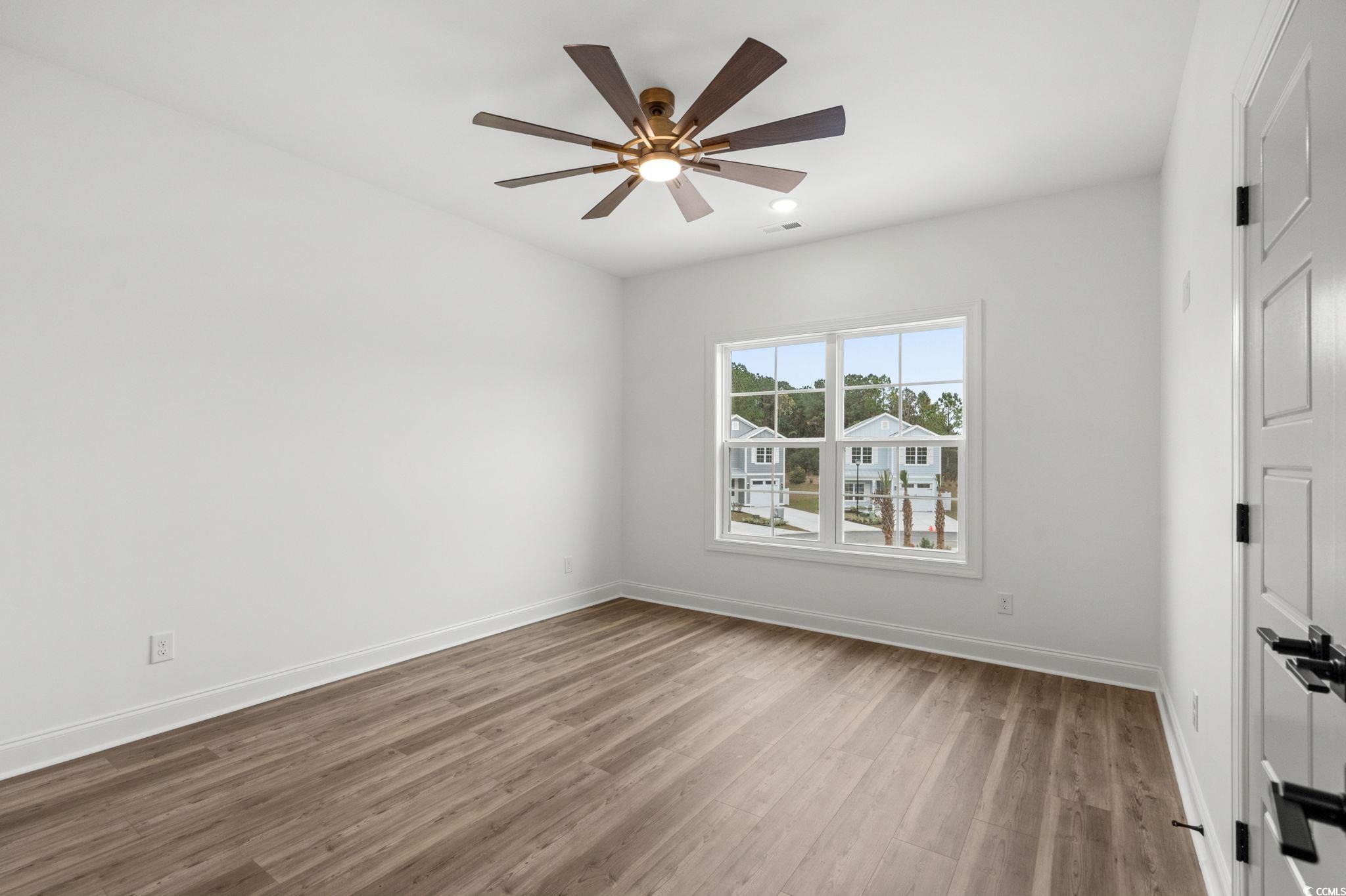 164 Arbor Ridge Circle Conway, SC 29526 - Photo 30 of 38 Unfurnished room featuring light wood finished floors and ceiling fan