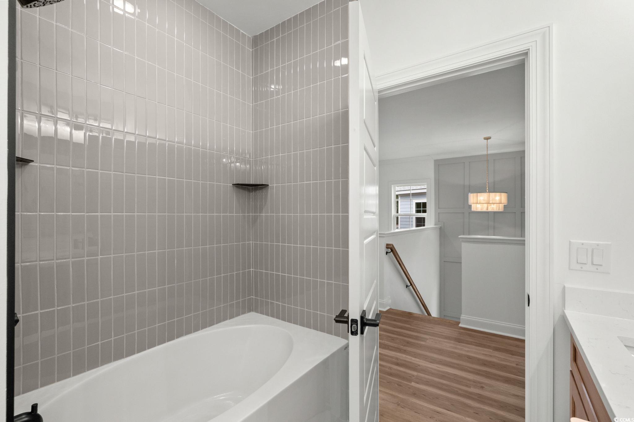 164 Arbor Ridge Circle Conway, SC 29526 - Photo 32 of 38 Full bathroom featuring vanity, tub / shower combination, and light wood-type flooring