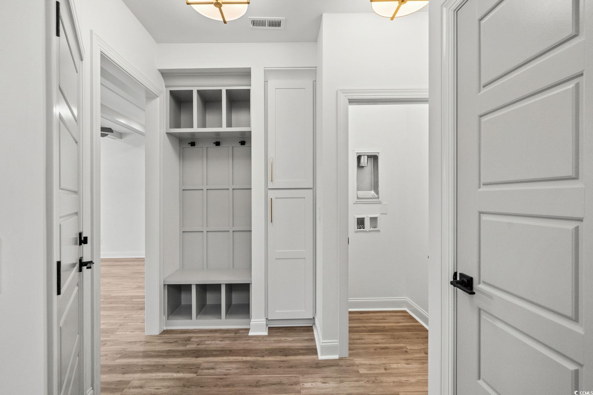 164 Arbor Ridge Circle Conway, SC 29526 - Photo 35 of 38 Mudroom with light wood-style flooring and baseboards