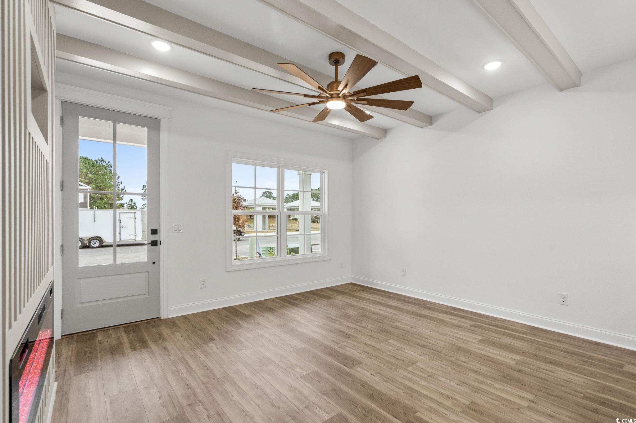 164 Arbor Ridge Circle Conway, SC 29526 - Photo 4 of 38 Spare room with ceiling fan, light wood-style flooring, beam ceiling, and recessed lighting