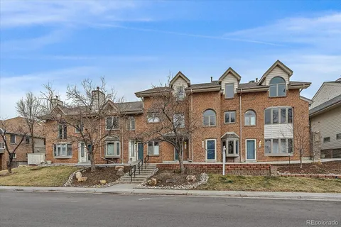 a view of a big house with street view