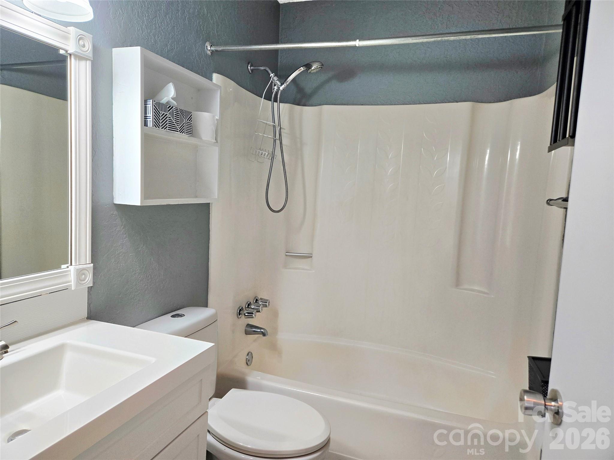 210 King George Lane Gastonia, NC 28056 - Photo 15 of 19 a bathroom with a sink a toilet and a bathtub