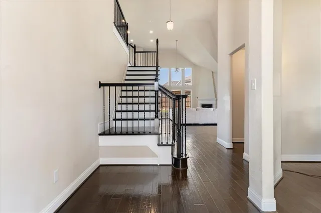 a view of entryway with wooden floor