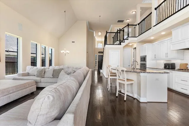 a living room with furniture and a table