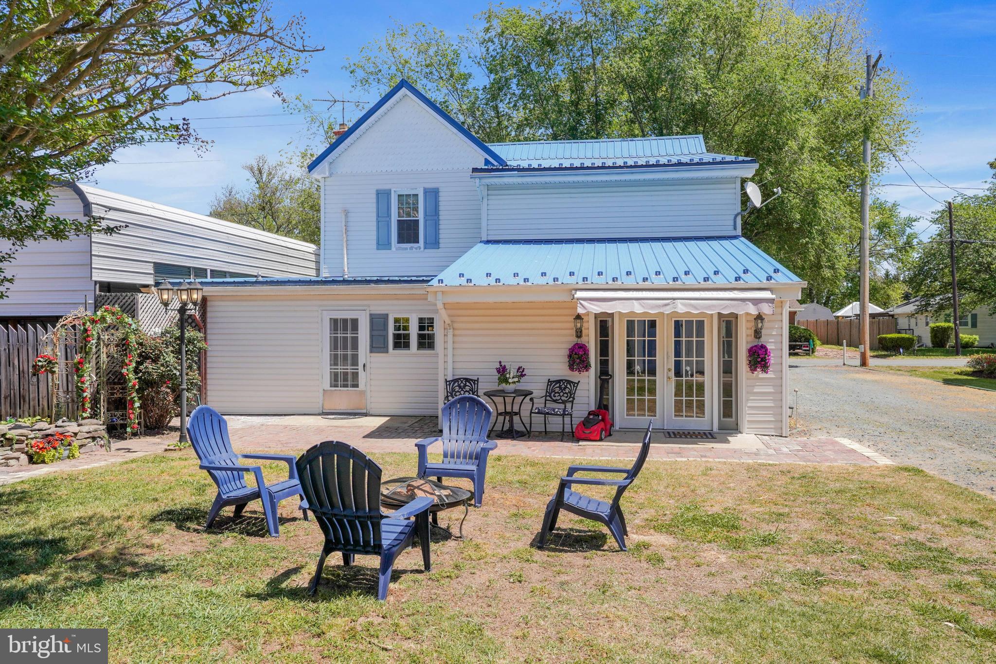 7215 Benedict Avenue Benedict, MD 20612 - Photo 17 of 47 a view of a house with backyard and sitting area