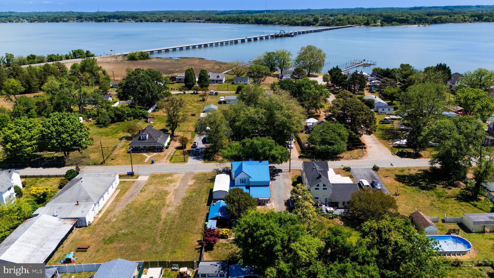 7215 Benedict Avenue Benedict, MD 20612 - Photo 22 of 47 an aerial view of a city with lake view