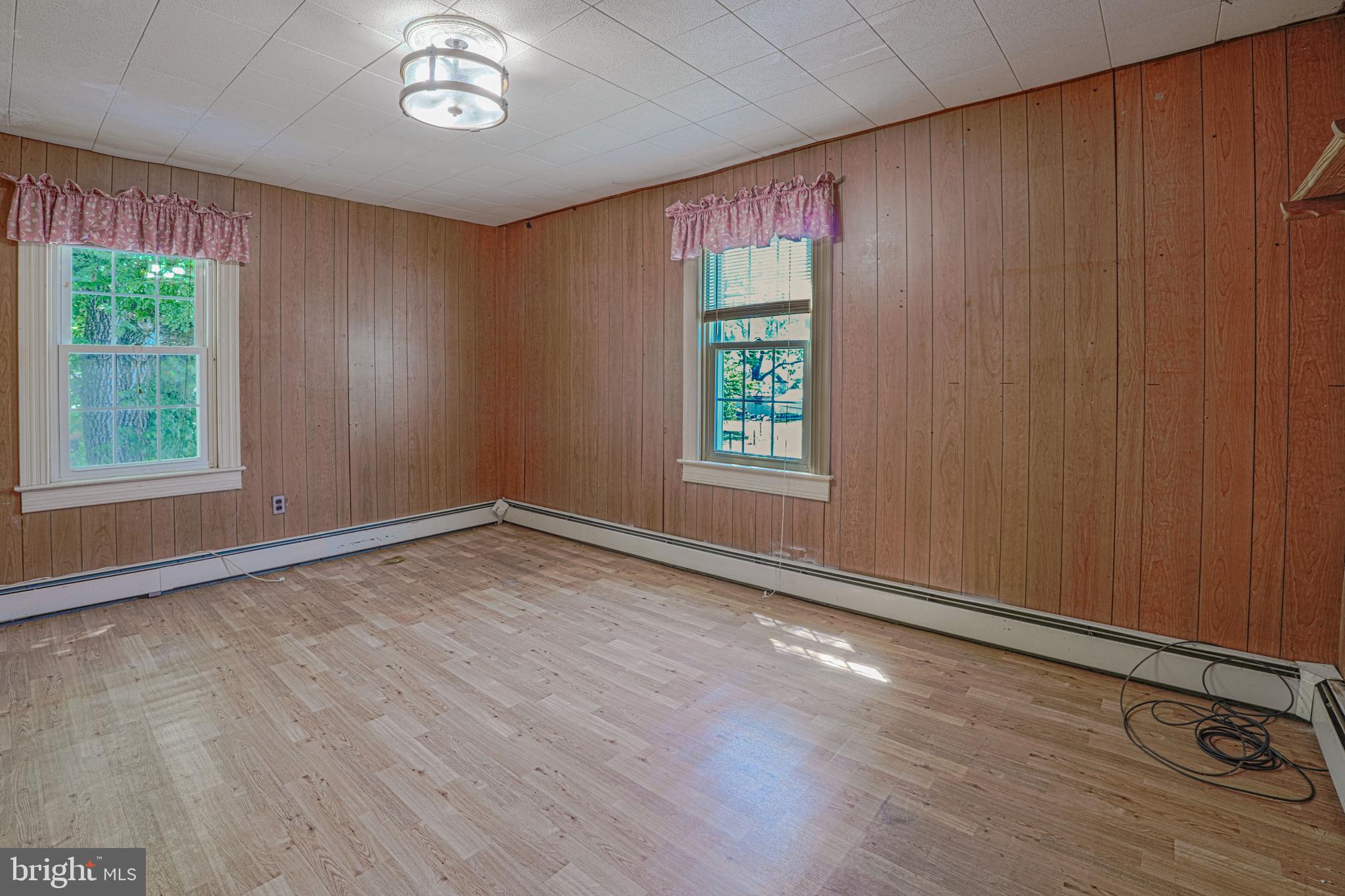 7215 Benedict Avenue Benedict, MD 20612 - Photo 37 of 47 an empty room with windows