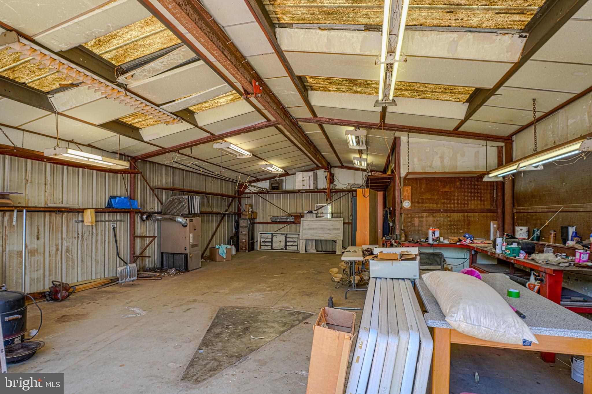 7215 Benedict Avenue Benedict, MD 20612 - Photo 10 of 47 a view of a garage with storage