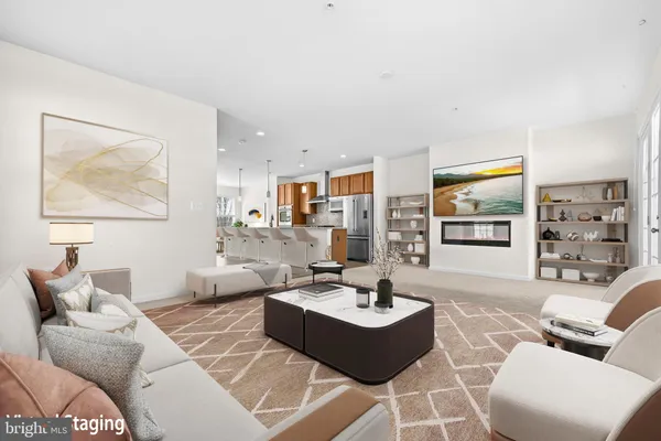 a kitchen with a refrigerator and a sink