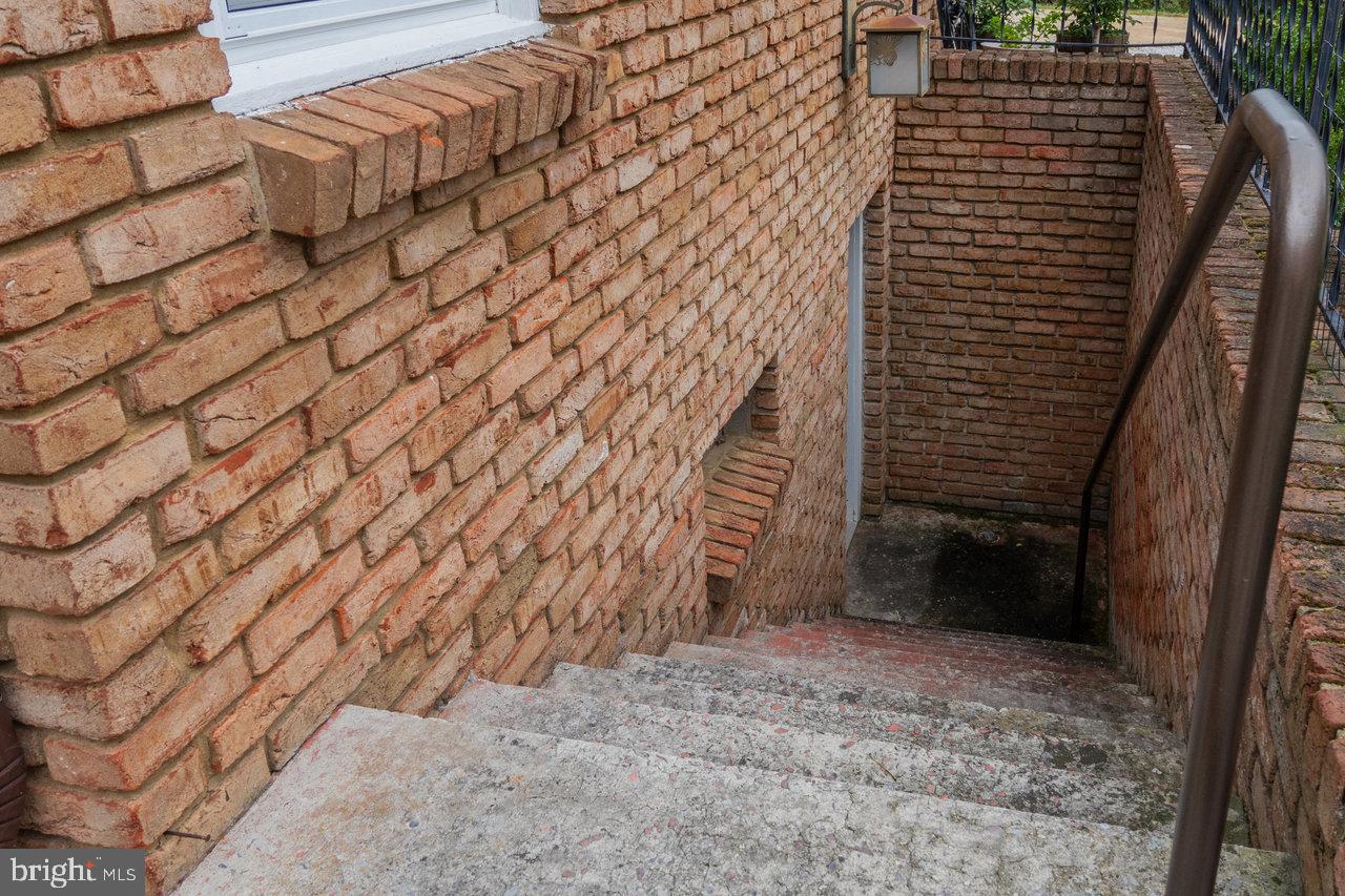 120 Galen Hedrick Road Franklin, WV 26807 - Photo 105 of 115 Charming brick staircase leading to a cozy entry.