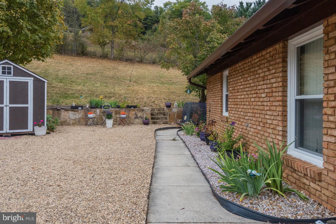 120 Galen Hedrick Road Franklin, WV 26807 - Photo 107 of 115 Charming garden path with rustic appeal.