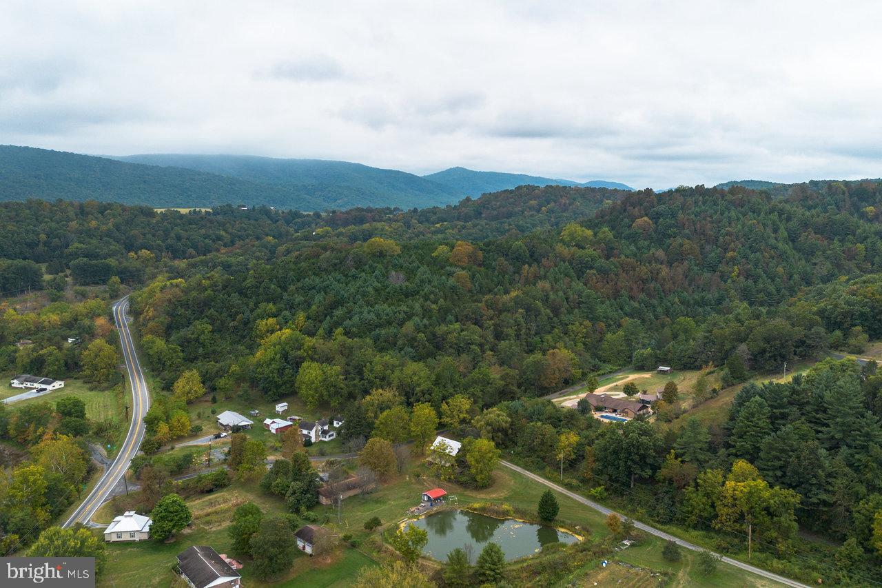 120 Galen Hedrick Road Franklin, WV 26807 - Photo 12 of 115 Serene countryside with rolling hills and trees.