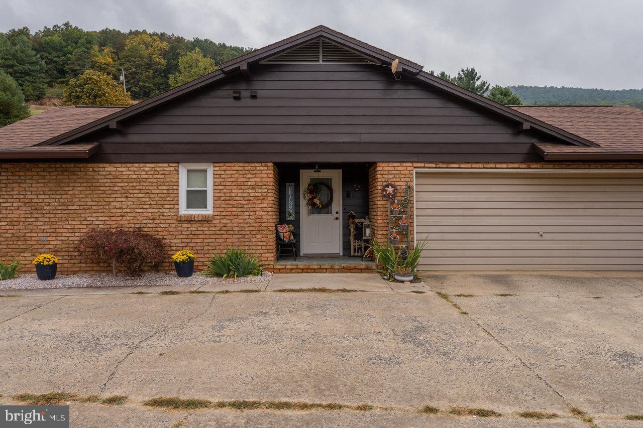 120 Galen Hedrick Road Franklin, WV 26807 - Photo 15 of 115 a front view of a house with a yard