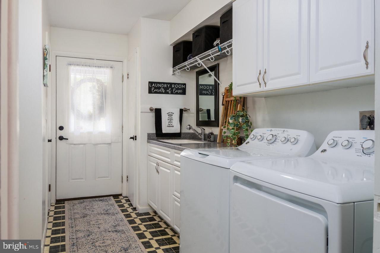 120 Galen Hedrick Road Franklin, WV 26807 - Photo 50 of 115 a kitchen with stainless steel appliances a refrigerator sink and cabinets