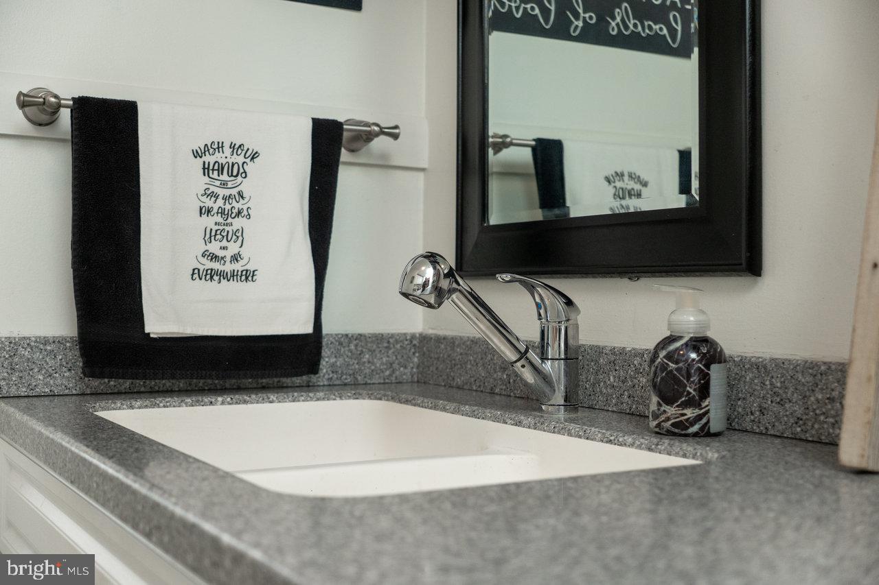 120 Galen Hedrick Road Franklin, WV 26807 - Photo 53 of 115 a bathroom with a sink and a mirror