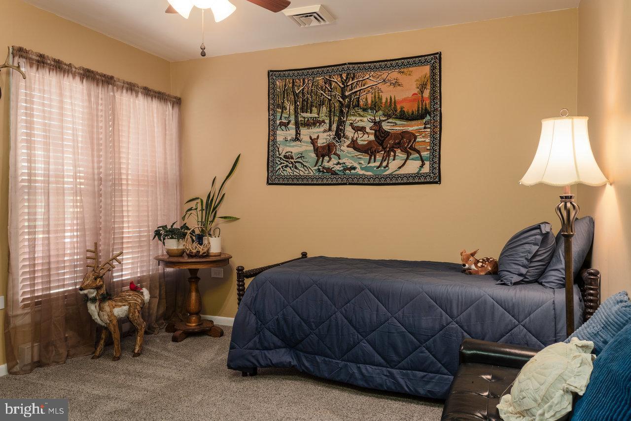 120 Galen Hedrick Road Franklin, WV 26807 - Photo 62 of 115 a bedroom with a bed and a window