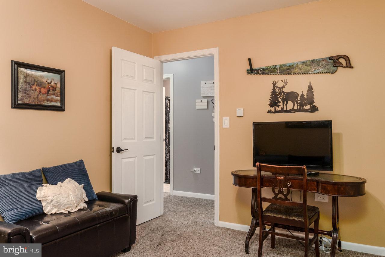 120 Galen Hedrick Road Franklin, WV 26807 - Photo 63 of 115 a living room with furniture and a flat screen tv