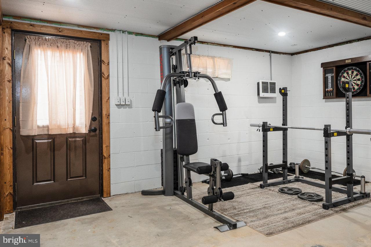120 Galen Hedrick Road Franklin, WV 26807 - Photo 67 of 115 Home gym with versatile workout equipment.