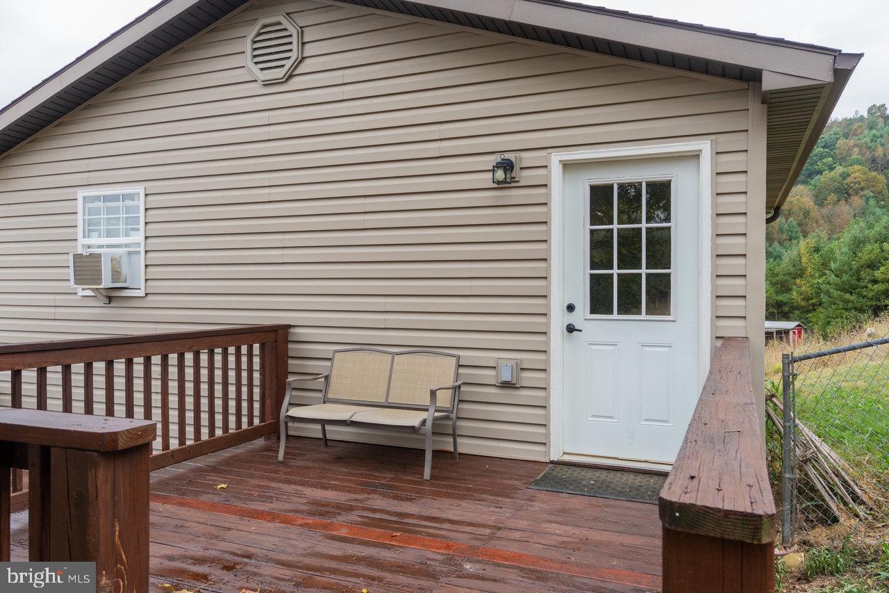 120 Galen Hedrick Road Franklin, WV 26807 - Photo 78 of 115 Charming deck entry with scenic backdrop.