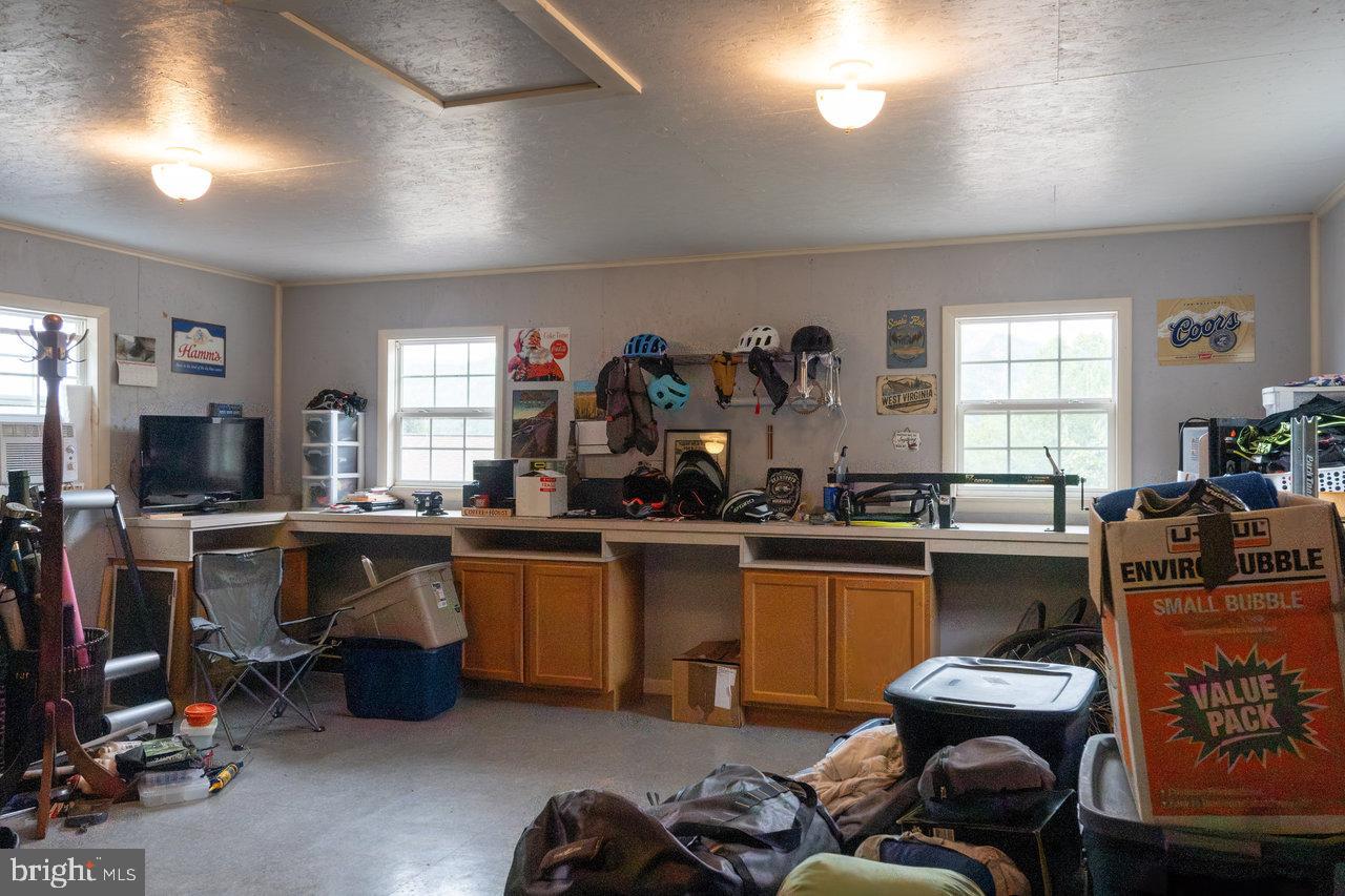 120 Galen Hedrick Road Franklin, WV 26807 - Photo 80 of 115 Spacious garage with organized chaos.