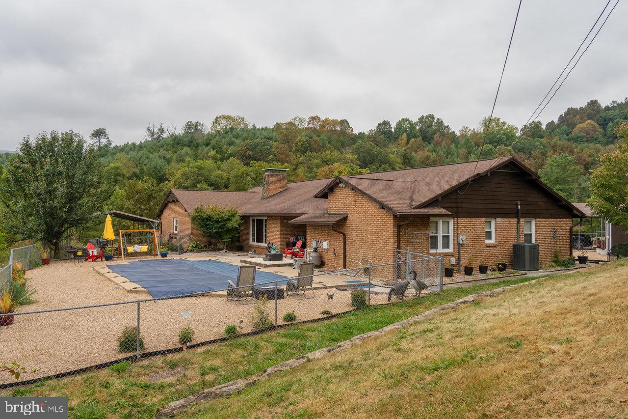 120 Galen Hedrick Road Franklin, WV 26807 - Photo 89 of 115 a front view of a house with a yard