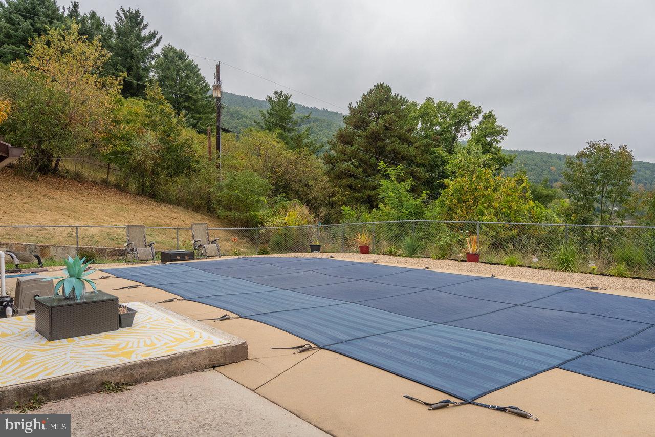 120 Galen Hedrick Road Franklin, WV 26807 - Photo 97 of 115 Tranquil outdoor space with pool cover.