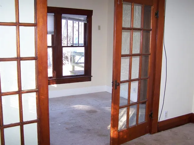 an empty room with windows