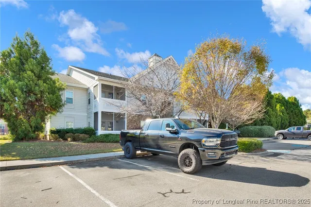 a car parked in front of a house