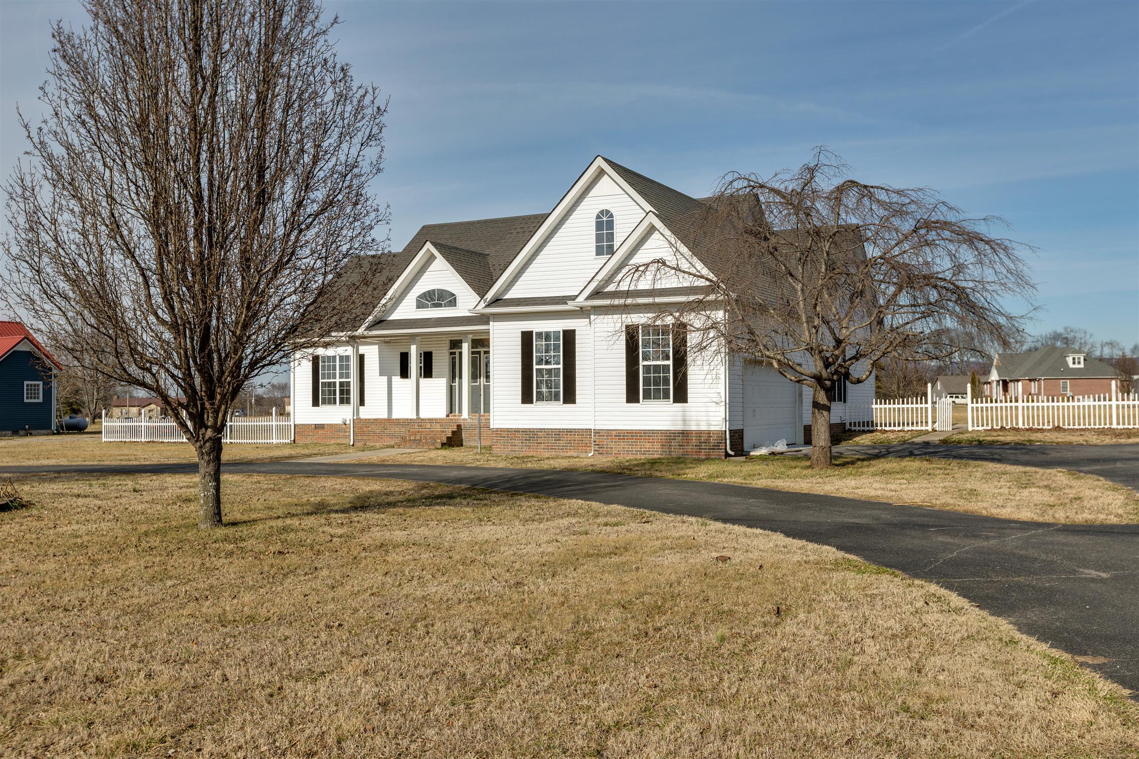 75 Keith Cove Road Cowan, TN 37318 - Photo 3 of 30 Nice black top circular drive with side entry garage