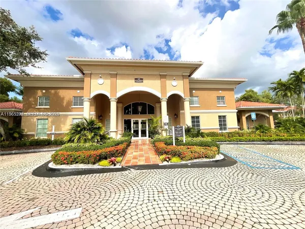 a view of front of house with outdoor seating