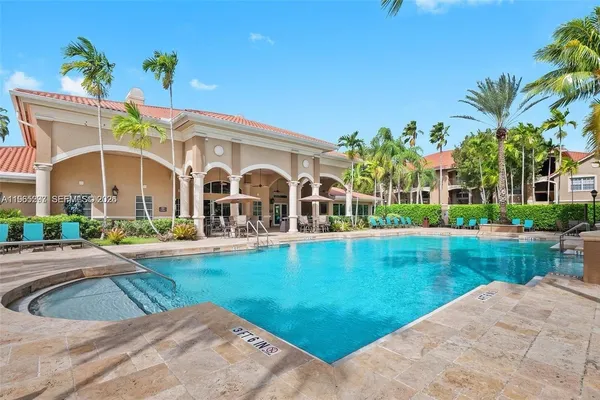 a view of a house with a swimming pool