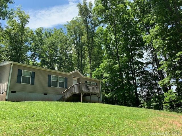 49 Ballard Ridge Road Leicester, NC 28748 - Photo 1 of 21 a view of house with backyard