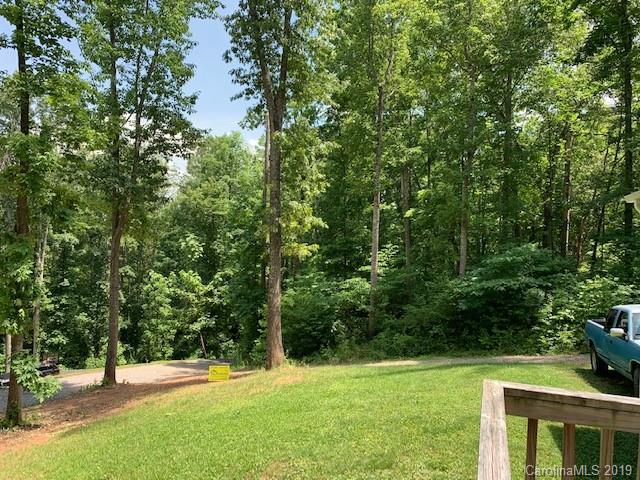 49 Ballard Ridge Road Leicester, NC 28748 - Photo 9 of 21 a view of green field with trees in the background