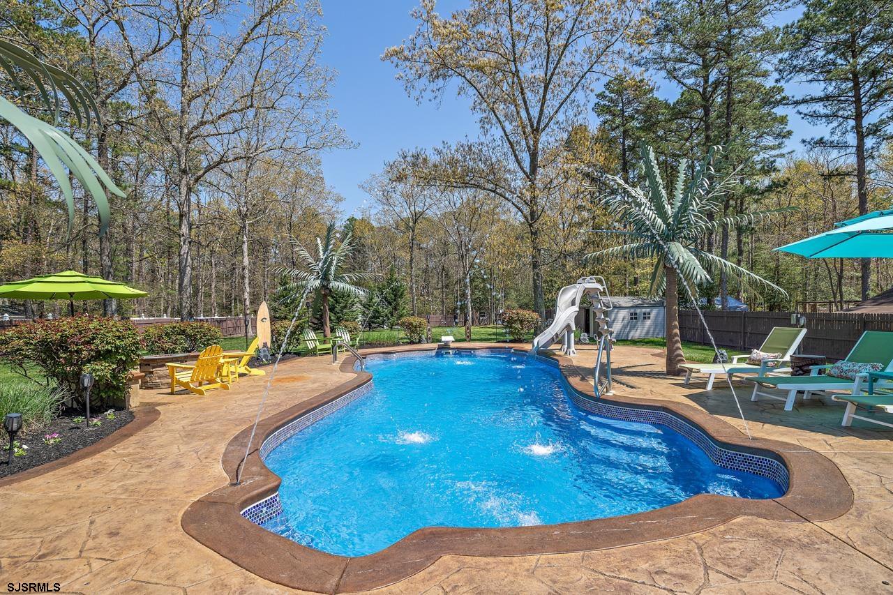 344 Old New York Road Port Republic, NJ 08241 - Photo 31 of 99 a view of a swimming pool with lounge chair