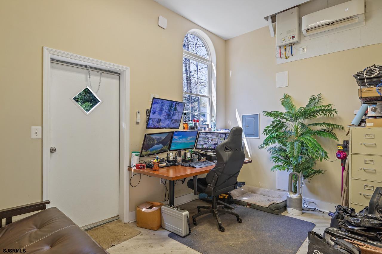 344 Old New York Road Port Republic, NJ 08241 - Photo 37 of 99 a living room with furniture and a potted plant