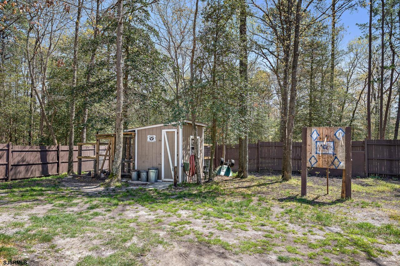 344 Old New York Road Port Republic, NJ 08241 - Photo 38 of 99 a view of a backyard with wooden fence