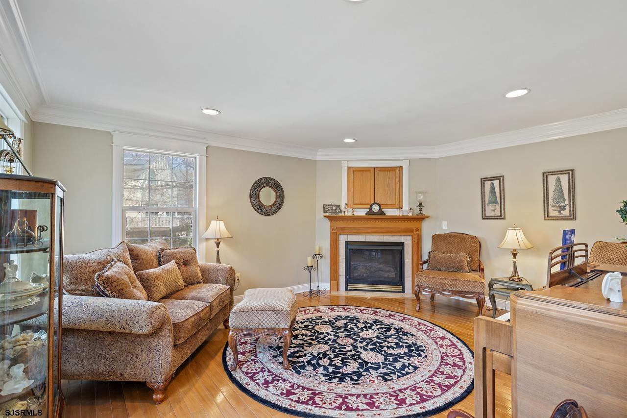 344 Old New York Road Port Republic, NJ 08241 - Photo 46 of 99 a living room with furniture a rug and a fireplace