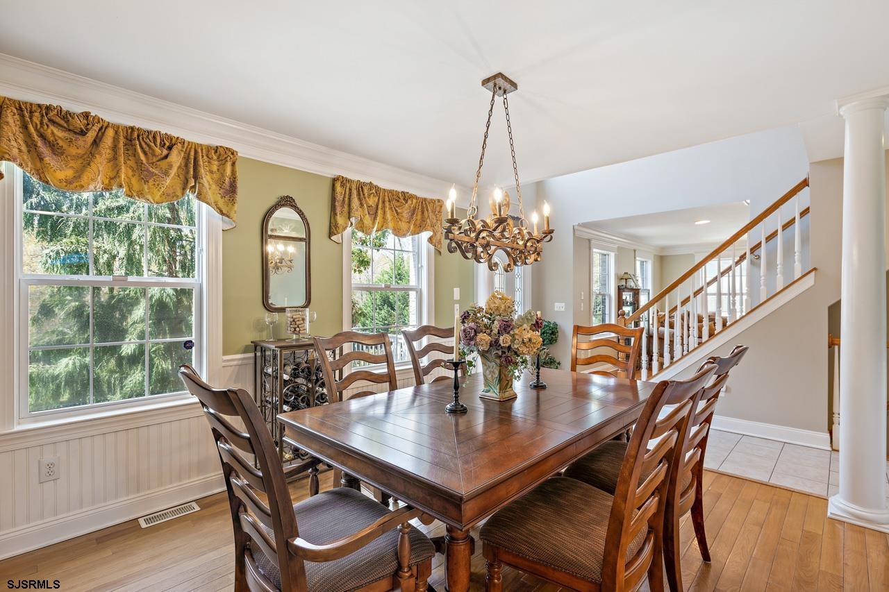344 Old New York Road Port Republic, NJ 08241 - Photo 48 of 99 a view of a dining room with furniture window and wooden floor