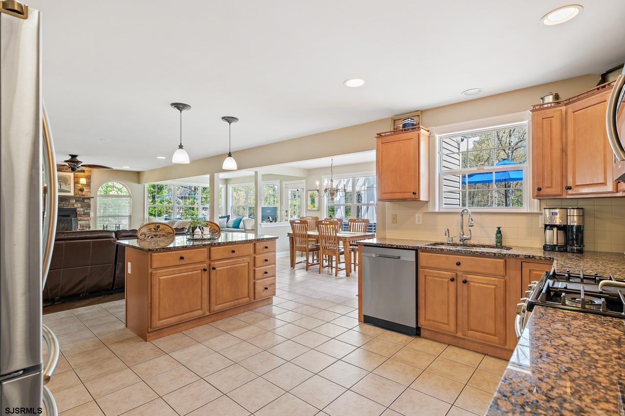 344 Old New York Road Port Republic, NJ 08241 - Photo 58 of 99 a large kitchen with kitchen island granite countertop lots of counter top and stainless steel appliances