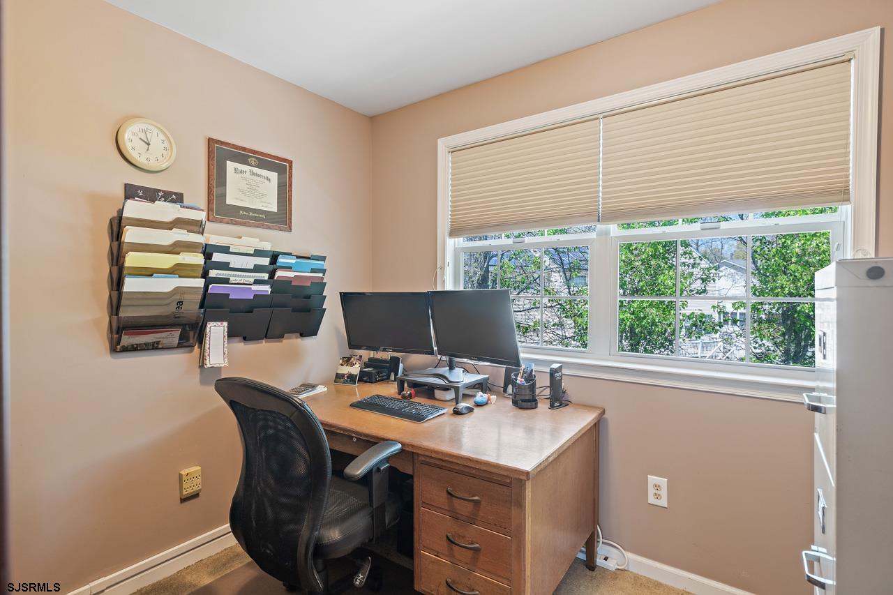 344 Old New York Road Port Republic, NJ 08241 - Photo 69 of 99 a view of a workspace with furniture and a window