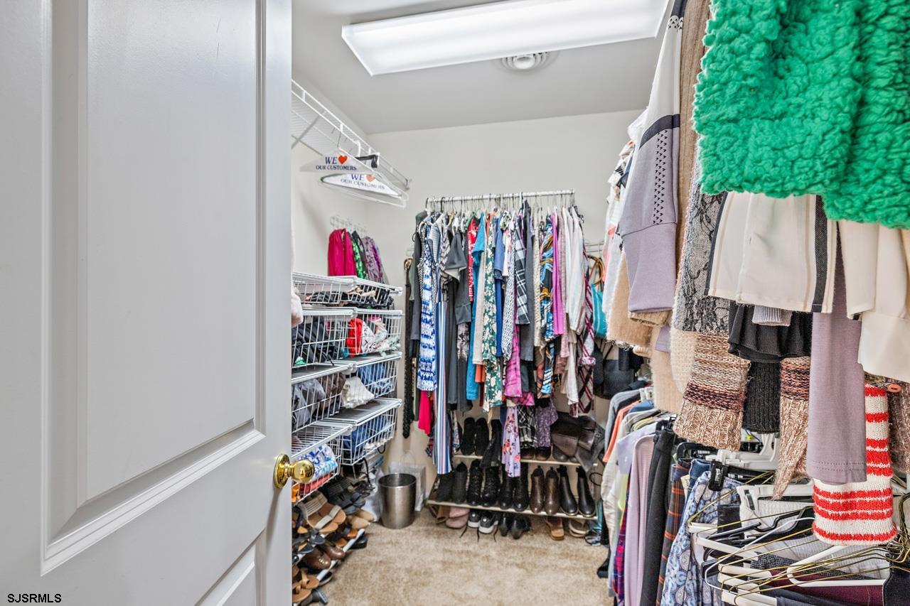 344 Old New York Road Port Republic, NJ 08241 - Photo 72 of 99 a view of walk in closet with clothes